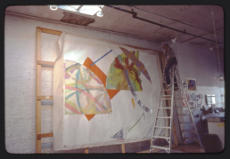 asst. Peter Stevens on ladder helping select Paintings for Museum of Art - Carnegie Institute exhibition. Broome Street Studio, 1981
